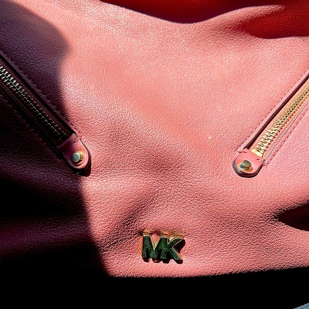 Michael Kors pink handbag with wallet